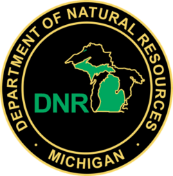 Outline of Michigan state with DNR text circled by text stating Michigan Department of Natural Resources