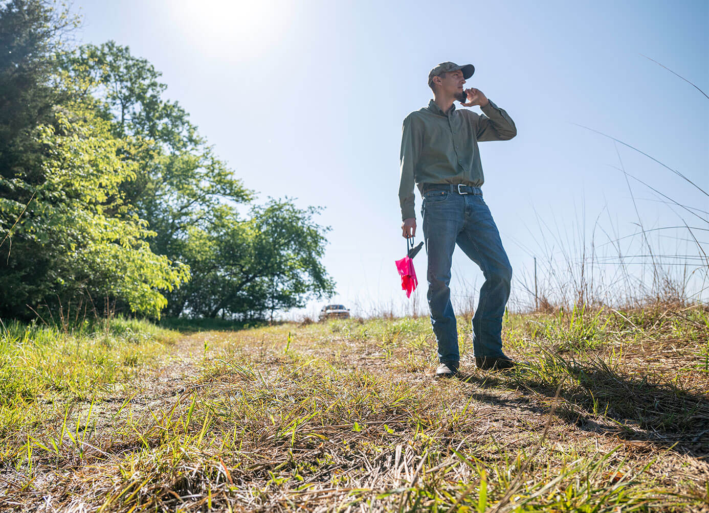 Worker on phone out in field